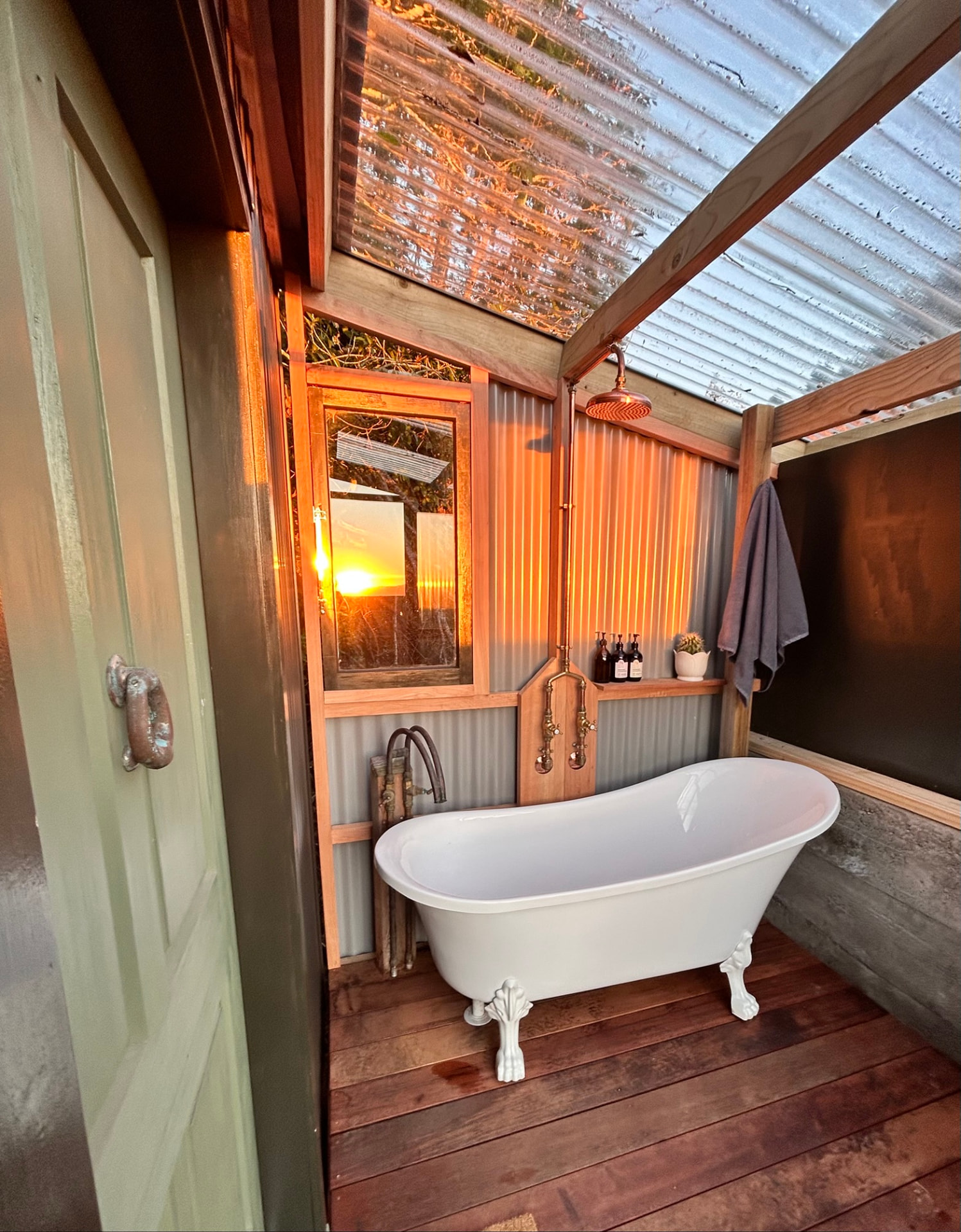 Bath on the Pod deck at sunset