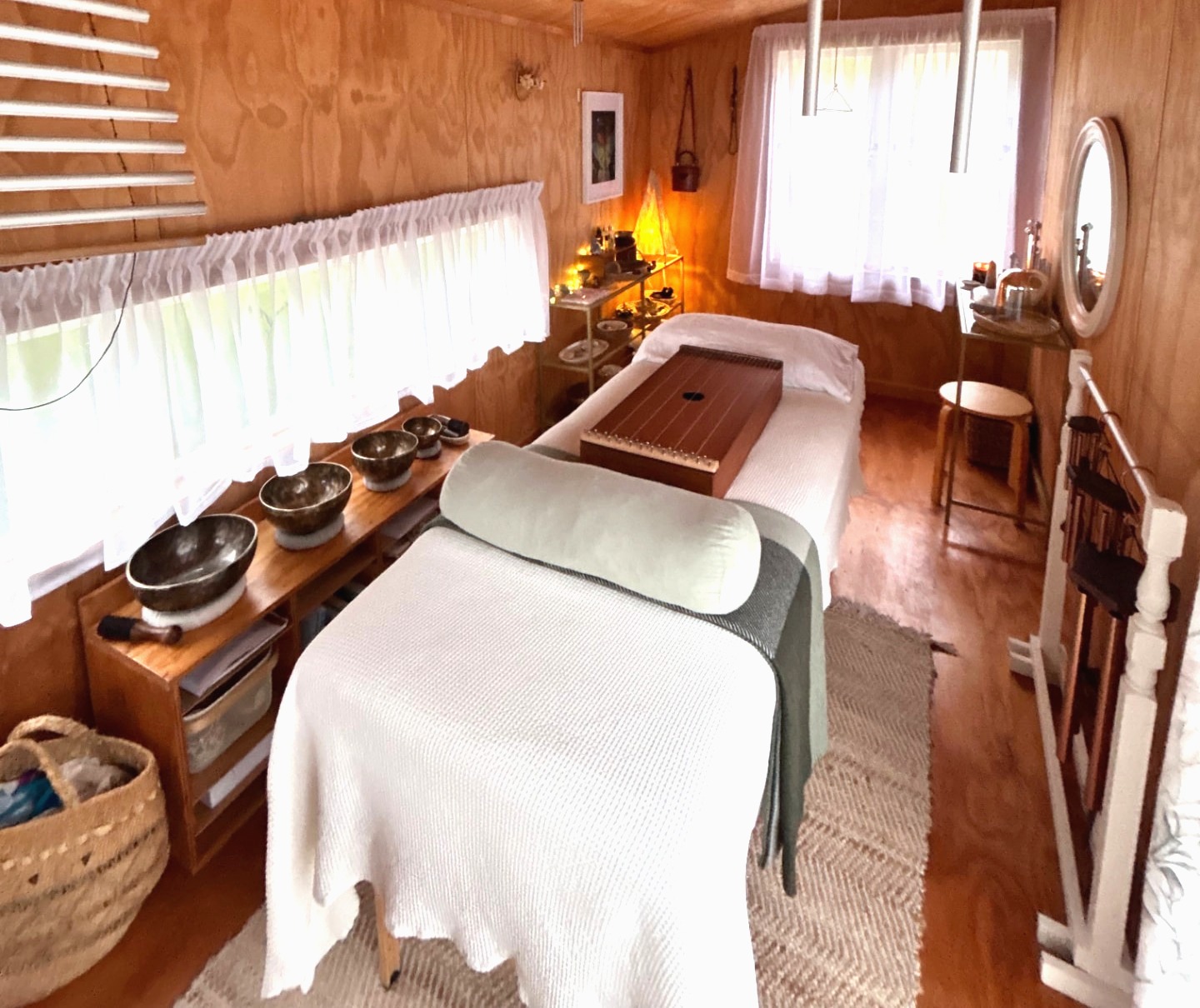 The onsite sound therapy studio with singing bowls, chimes and treatment table